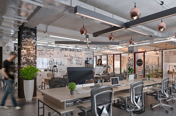 Multi-ethnic business people working at desk in office